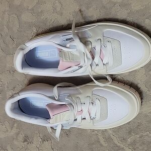 Puma shoes size 9. White. Soft pink and baby blue.